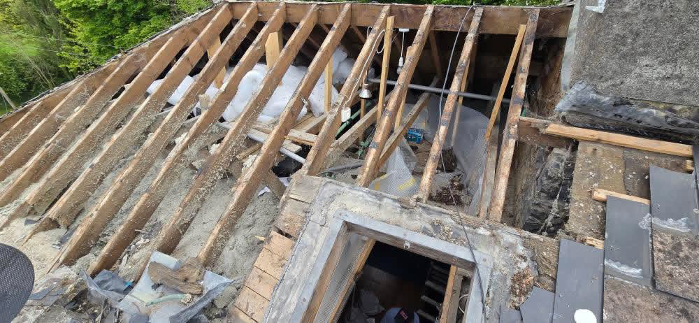 Roof tile strip-out and replacement in progress Ireland